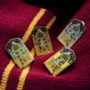 Warner Bros Houses In The Great Hall Enamel Pin Set 1 Warner Bros Houses In The Great Hall Enamel Pin Set -Harry Potter Online Store product HousePinsGroup